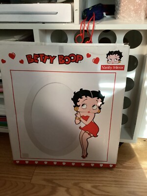betty boop vanity mirror brand new in original box small blemish in the wood.