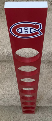 MONTREAL CANADIENS 8 puck vertical hanging wood hockey puck display.