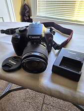 Canon EOS Rebel T100 DSLR 18MP 18-55mm Lens 3x Zoom Bag Charger Strap
