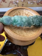 GRADE A JADEITE/JADE  RUYI CARVING CIGARETTE HOLDER DISGUISED AS A NECKLACE.