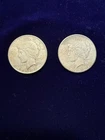 Two liberty silver dollars one ,1922 A and one, 1926 A = 2 coins total