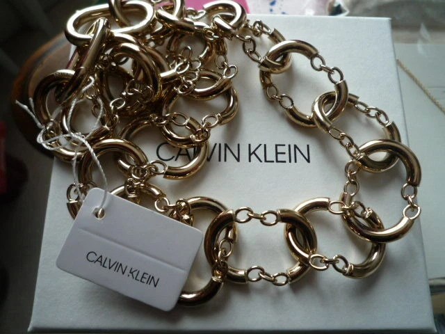 SPLENDIDE COLLIER "CALVIN KLEIN" DORE GROS MAILLONS FANTAISIE/NEUF/ECRIN GRIFFE - Photo 3/3