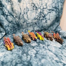 7 Dinosaur Shaped Cars Unbranded.