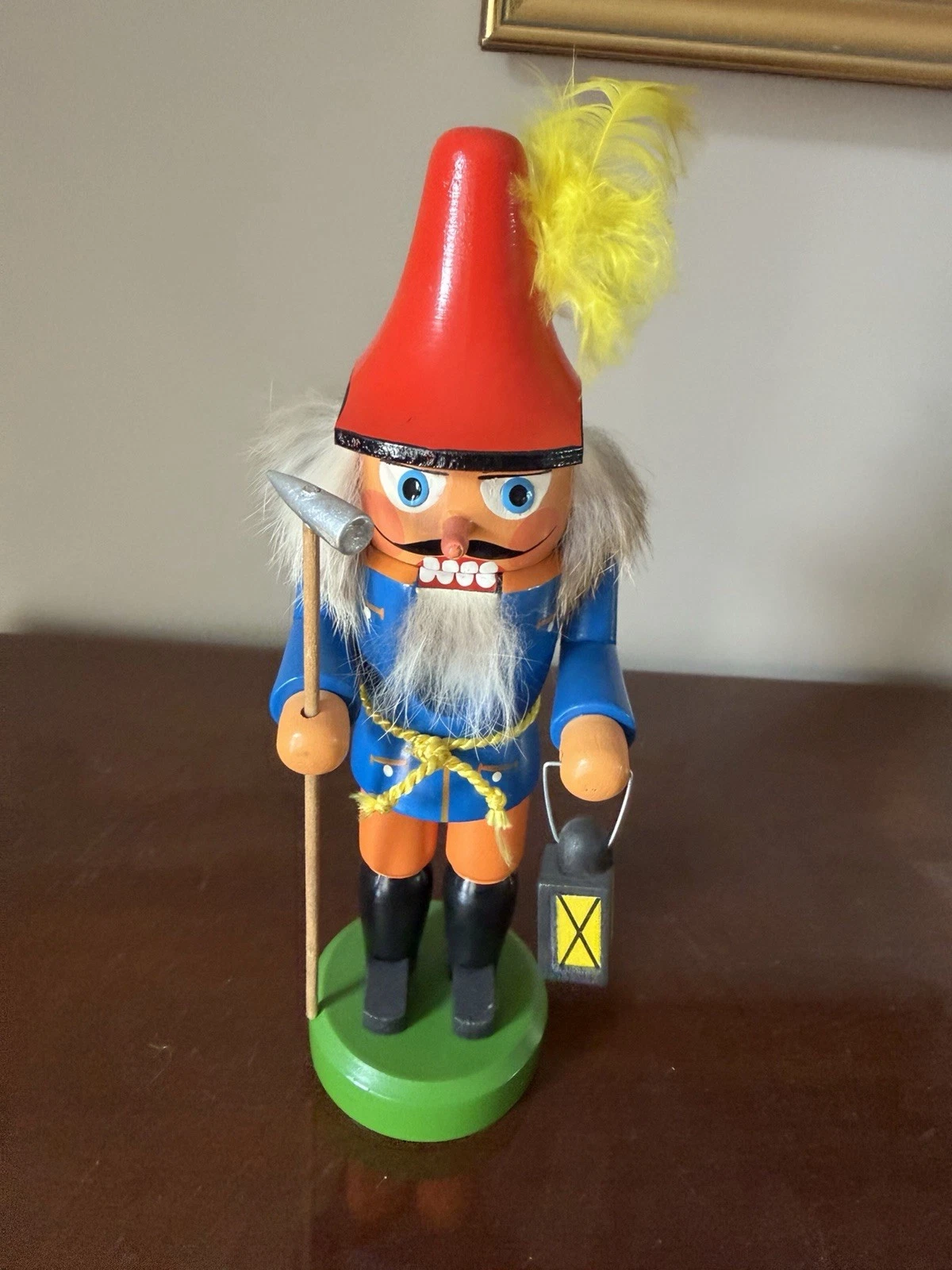 VEB Rodau Nutcracker. East Germany wood multicolor w/ feather, lantern & staff