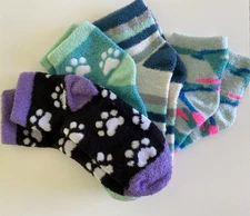NWOT Lot of 4 Pairs Women’s Fuzzy Socks w/ Colorful Stripe Patterns & Paw Prints