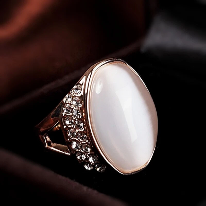 18K Rose Gold Filled Simulated Opal Cubic Zirconia Oval V Band Side Stone Ring Foto 3 de 4