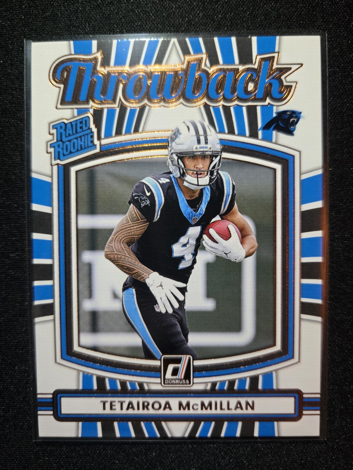 2025 Donruss Rated Rookie Throwback Tetairoa Mcmillan #32 (RC) Carolina Panthers