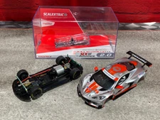 1/32 Advance SCX Corvette CR8 Chassis, Case & Analog Silver Top- w/Lights - New