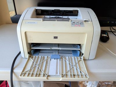 HP LaserJet 1018 Standard Laser Printer - front door does not stay closed