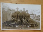 WW1 Real Photo Postcard Group of men from the Norfolk Regiment with Lewis Guns