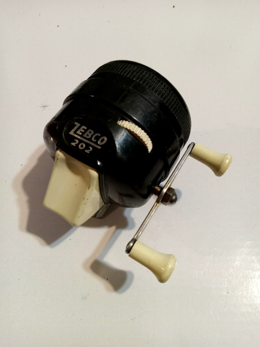 Vintage Zebco 202 Casting Fishing Reel Black with White Handles | eBay