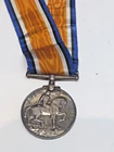 ANTIQUE MILITARY WW1 SERVICE MEDAL 76594 GNR. E MAYLETT RA