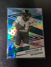 Travis Etienne 549 2025 Panini Revolution - 92 Blue Astro Jacksonville Jaguars Travis Etienne 549 2025 Panini Revolution - 92 Blue Astro Jacksonville Jaguars