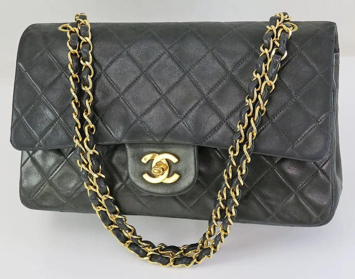 CHANEL DOUBLE SIDED CLASSIC FLAP HANDBAG, black quilted leather with iconic  diamond pattern, gold hardware, chain and leather intervowen shoulder  strap, leather matching interior, inside sticker 4582565, 22cm x 14cm H x