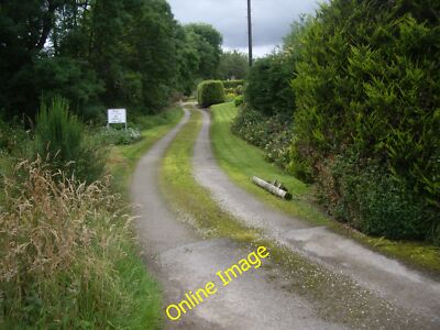 Photo 12x8 An access lane in Milltown of Kildrummy Ca' Canny says the c2012