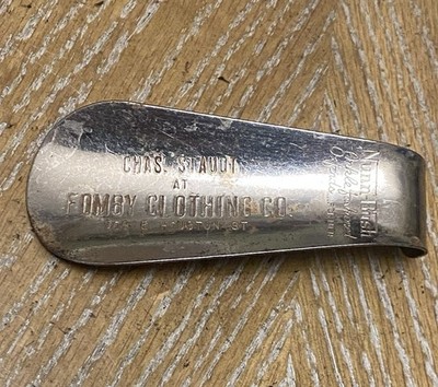 Metal Advertising Shoe Horn - FOMBY CLOTHING CO. SA, TX Chas Staudt