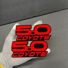 Red COYOTE 5.0 Emblem Badges On Black Fender Angry Aggressive Racing