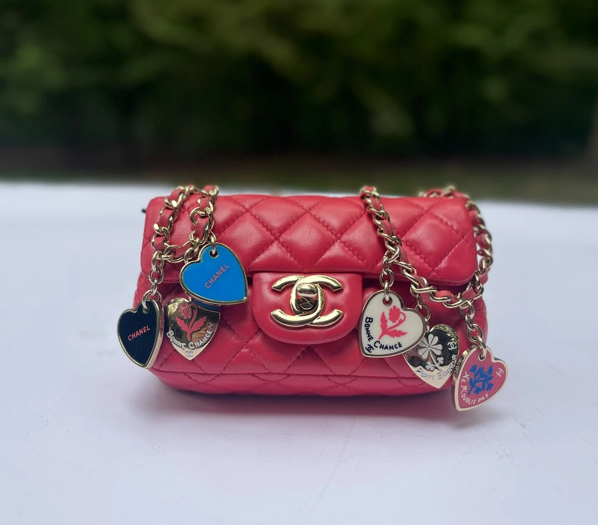 Authentic Chanel Lambskin Pink Leather Charms Mini Flap Crossbody Clutch  Bag