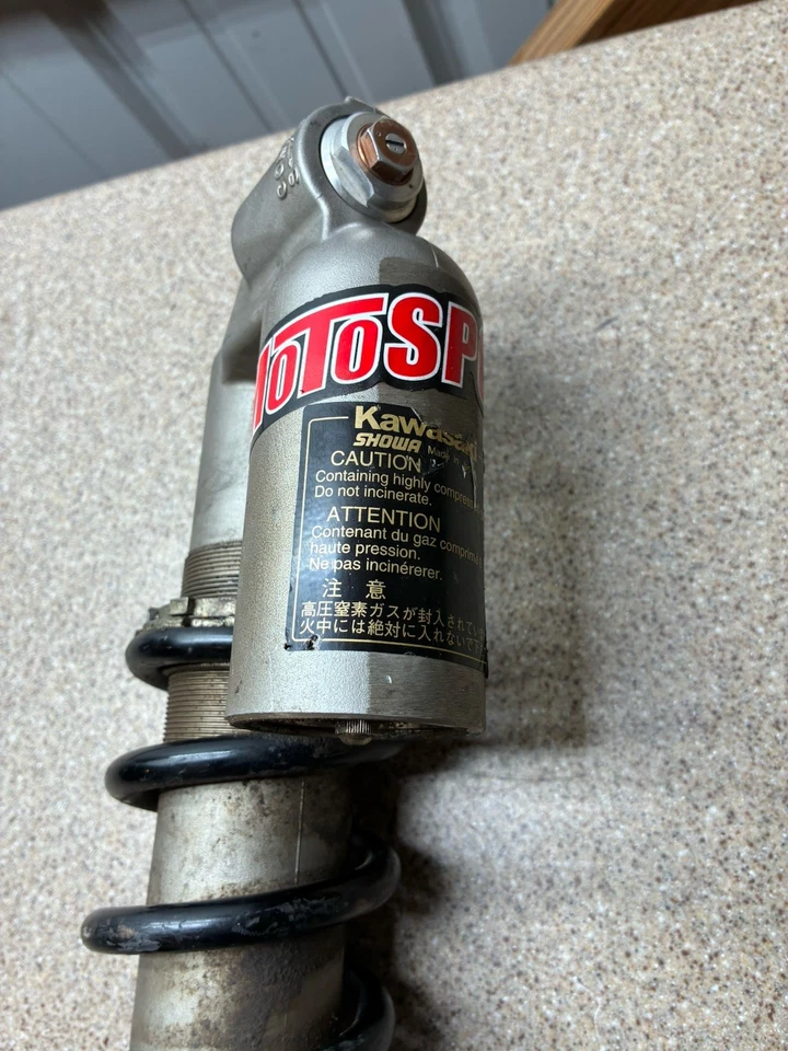 Kawasaki KX250F 2009-2016 suspensión de amortiguador trasero OEM suspensión de resorte Foto 2 de 4