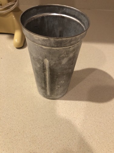 Beige Hamilton Beach Drink Master 727 milkshake maker with worn silver finish and subtle rust spots on a light countertop.