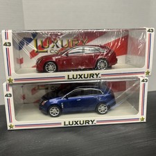 Set of 2 LUXURY COLLECTIBLES 1/43 CADILLAC 2011 SRX CROSSOVER - CTS V WAGON