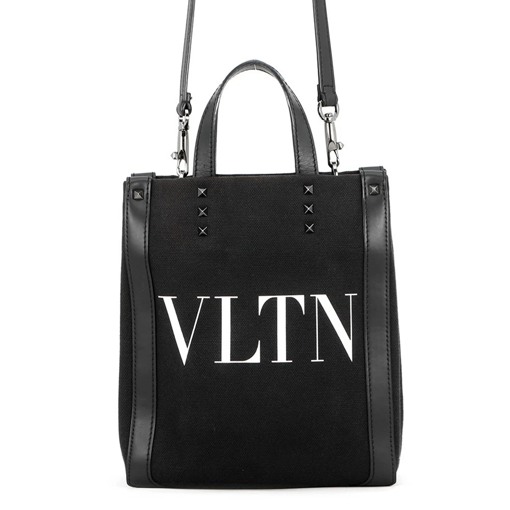 Valentino — Valentino Garavani VLTN Lock Studded 2-Way Bag Canvas/Leather Black/White 5Y...