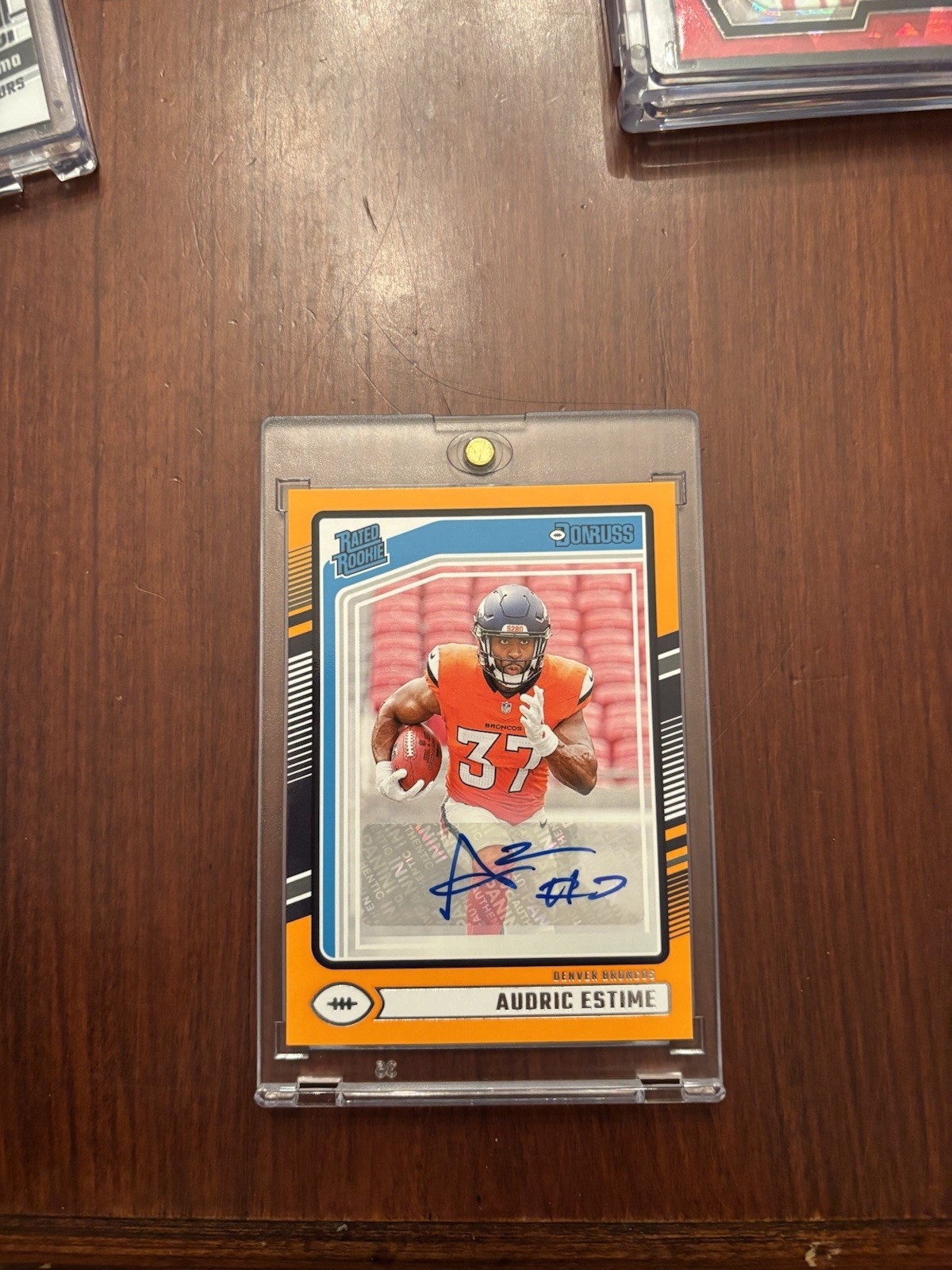 Audric Estime 2024 Panini Donruss Rated Rookie Orange Auto #335 Broncos