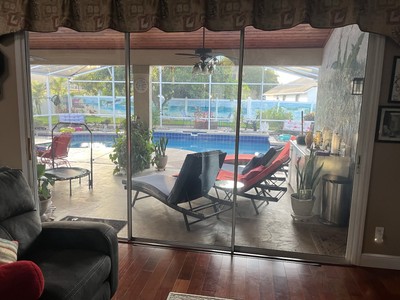 TRIPLE LEAF SLIDING PATIO That is a 12'0'' x 8'0'' triple door double pane.