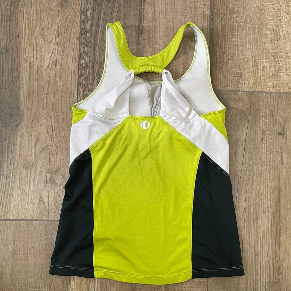 Camiseta sin mangas y pantalones cortos Pearl Izumi para mujer mediana verde y negra paquete de ciclismo para correr Foto 3 de 4