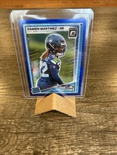 2025 Panini Donruss Optic Damien Martinez Seahawks Rated Rookie Blue Prizm #298
