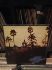 ORIGINAL Vg 1976 THE EAGLES Album HOTEL CALIFORNIA Vinyl Canada Import +Poster