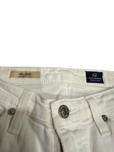 White AG Adriano Goldschmied jeans 25R with button closure, belt loops, and branded leather patch on waistband.