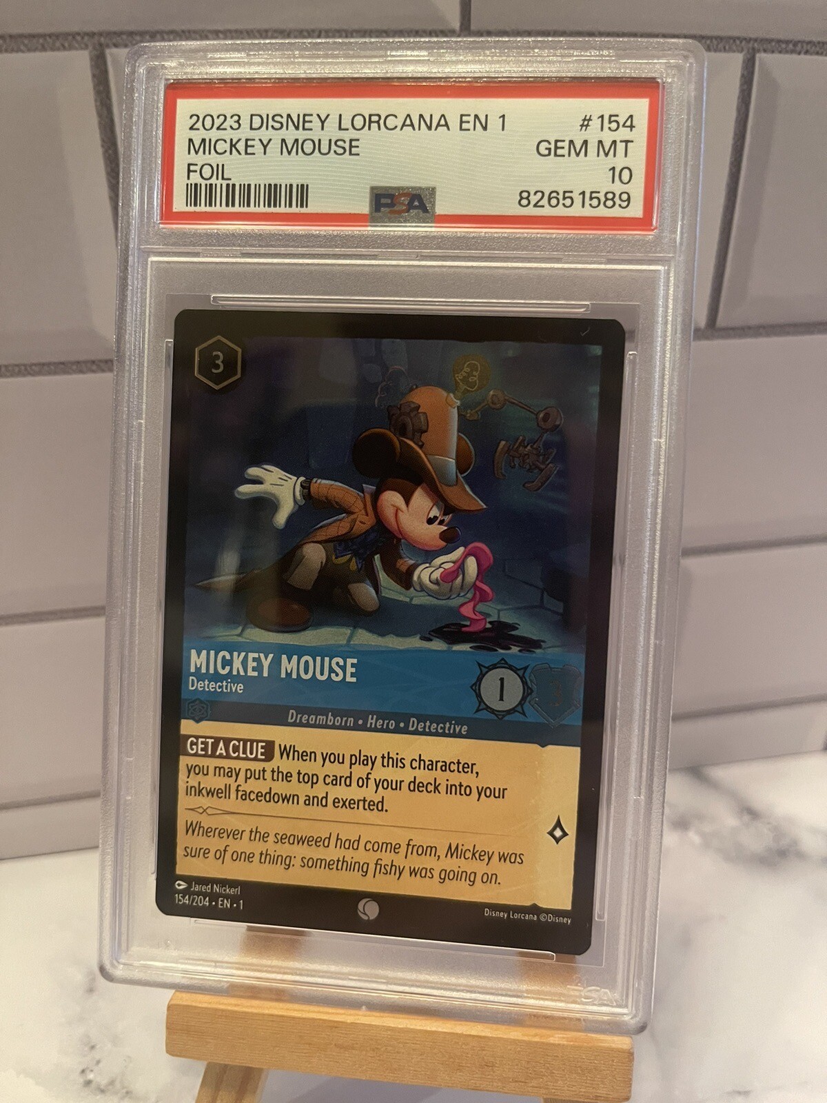 2023 Disney Lorcana Chapter 1 Mickey Mouse Detective 154/204 FOIL COMMON PSA 10