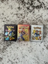 3 decks of pokemon cards (,silver,black,rainbow) 55 cards in each deck 