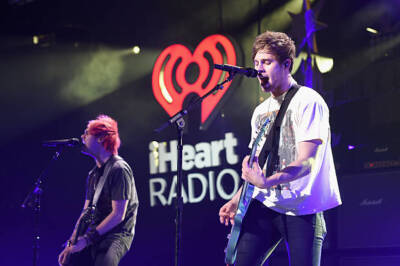 Michael Clifford Luke Hemmings of 5 Seconds Of Summer perform onst - Old Photo