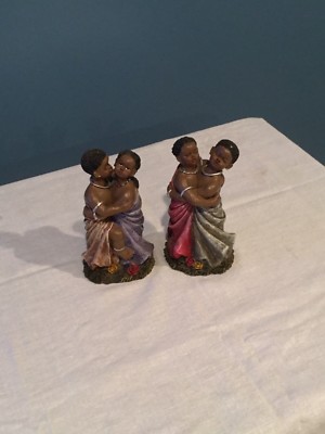 Two Cornerstone Creations African dancing figures made in China. 6  tall. 