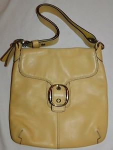 yellow leather duffle bag
