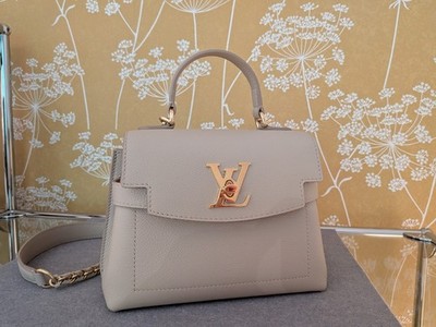 Original Louis Vuitton Lockme Ever Mini, nwtg.