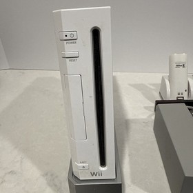 Wii console bundle with 4 Nunchuck Controllers 4 Controllers  Recharge Batteries