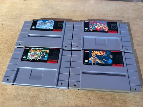 4 Games SNES lot Pilotwings, Super Mario All Stars, Starfox, Super Punchout