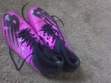 spikes track, field shoes they are a size 9 in kids they are purple new balances