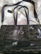 Black Coach leather diaper bag gender neutral, satin black interior