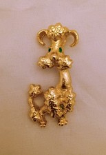 Vintage INS Gold Tone Poodle Dog Green Eyes Brooch Pin 1.75"
