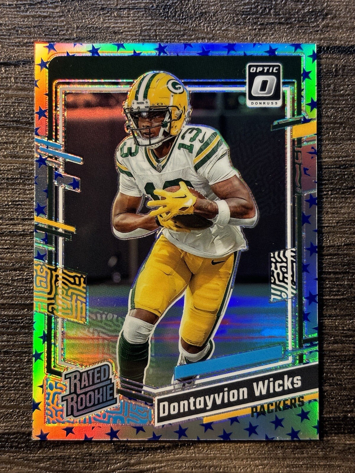 Dontayvion Wicks 2023 Panini Donruss Optic STARS PRIZM RATED ROOKIE #249 SSP RC