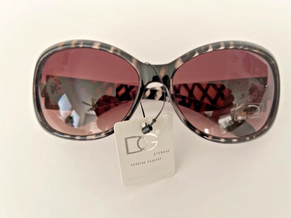 Gafas de sol DG de gran tamaño ovaladas envolventes marrón ámbar marco a rayas calidad óptica Foto 4 de 4