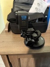 GoPro 13 Hero Black With Two Batteries And Holding Stick