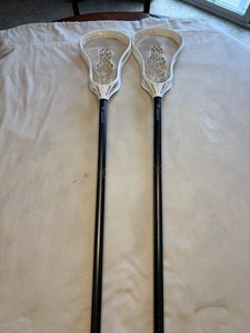 Warrior Evo Warp Complete Lacrosse Sticks (2) White Heads Black Shafts