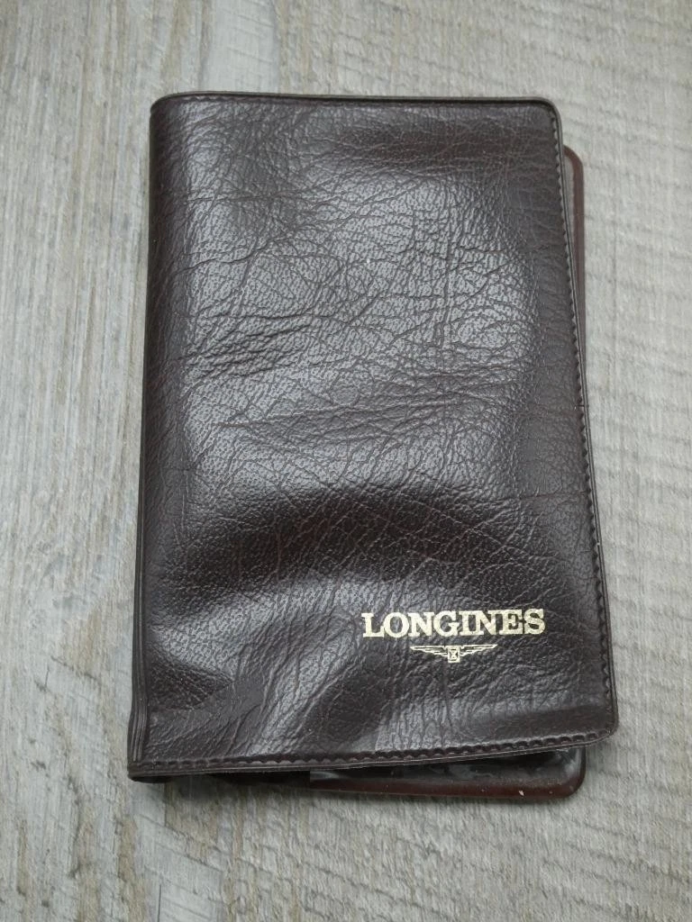 Folleto de instrucciones Longines vintage y bolsa marrón, ajuste de fecha y hora
