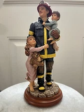 Red Hats Of Courage Hero II Sculpture - 9” Tall Fireman Holding Children