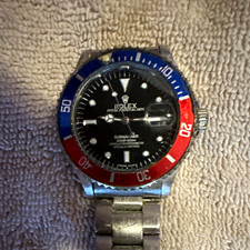 Rolex Submariner Date Pepsi Blue/Red Bezel Black Dial 40mm Steel Auto 300m